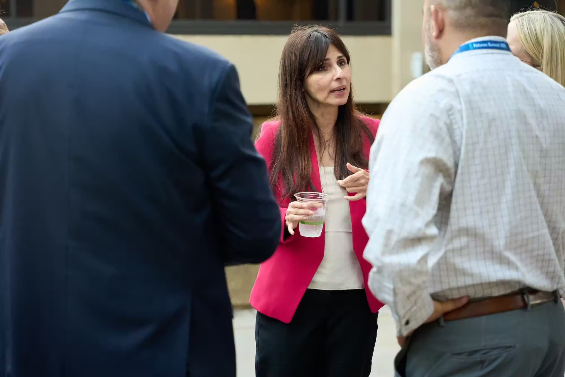 Chancellor Christian discussing with people